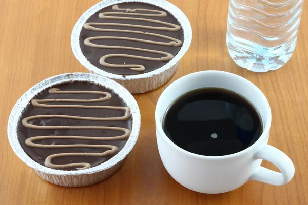 Schokoladenoberseite Sahne und Kaffee. — Stockfoto
