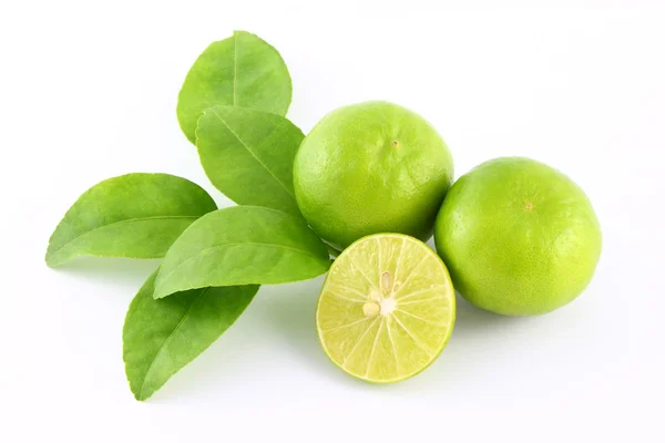 Limes frutas e folhas — Fotografia de Stock