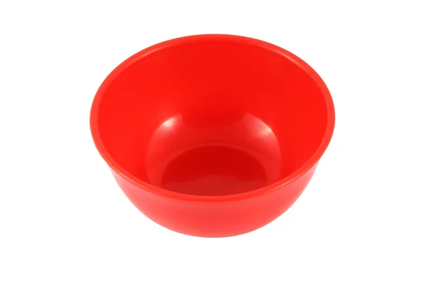 Czerwone plastikowe miska na białym tle. — Zdjęcie stockowe