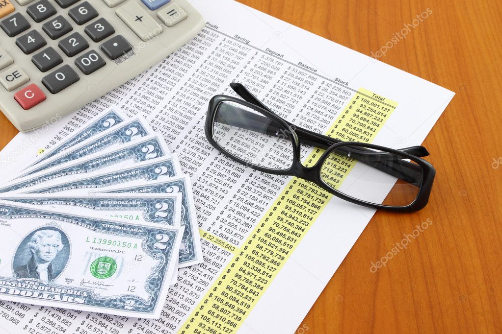 Eye glasses on accounting table.