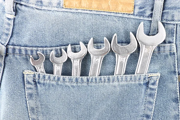 stock image Wrenches package in engineer pocket .