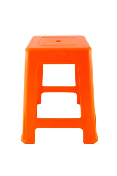 Beyaz zemin üzerinde doğrudan turuncu plastik dikdörtgen sandalye. — Stok fotoğraf