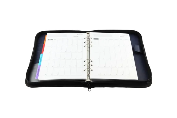 Capa de tecido azul calendário aberto notebook no fundo branco . — Fotografia de Stock