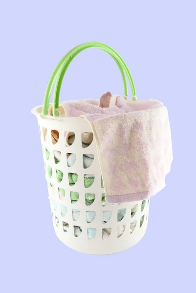 Basket holder up of cloth hang before washing on blue background. — Stock Photo, Image
