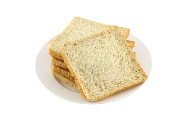 Pilha frontal de prato de pão de fatia de trigo no fundo branco . — Fotografia de Stock