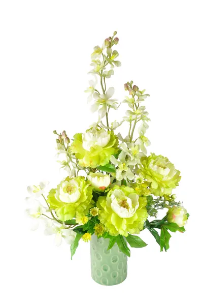 Arrangement de fleurs artificielles colorées sur fond blanc Images De Stock Libres De Droits