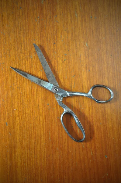 Old scissor on wood background — Stock Photo, Image