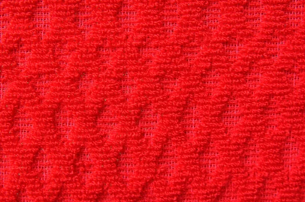 Κοντινό πλάνο της μοτίβο υφής κλωστοϋφαντουργίας κόκκινο μαλλί — Φωτογραφία Αρχείου
