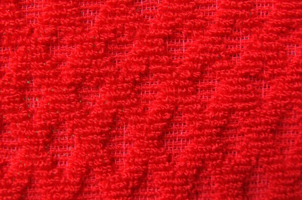 Närbild på mönster röda ull textil konsistens — Stockfoto