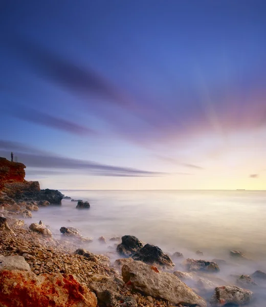 Море на заході сонця — стокове фото