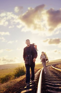 Tourists on railroad clipart