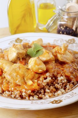 Traditional russian dish cooked buckwheat with porcini