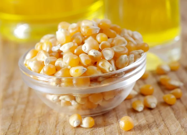 Corn and oil — Stock Photo, Image