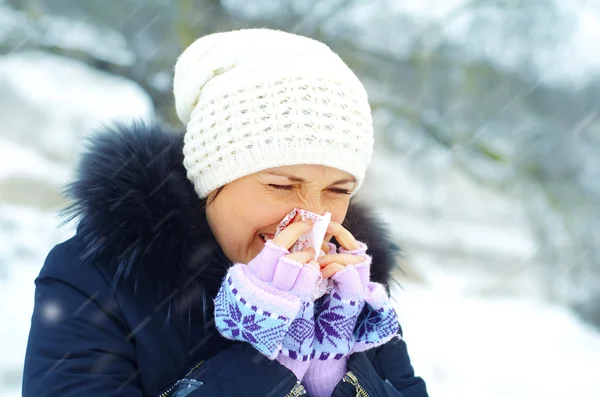 stock image Young woman blow one's nose