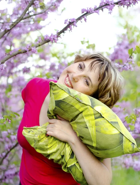 Woman and pillow — Stock Photo, Image
