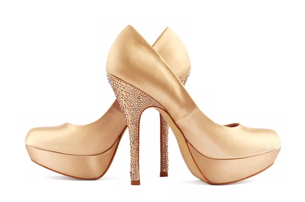 Золотая обувь — стоковое фото