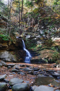 Autumn Waterfall in mountain clipart