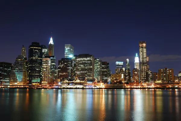 Manhattan på natten i new york city — Stockfoto