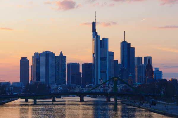 The view at sunset of the skyline of Frankfurt am Main from the Deutschherrn bridge.