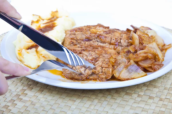 Slicing grilled chicken steak Stock Image