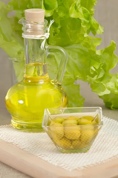 Olive oil with olives — Stock Photo, Image