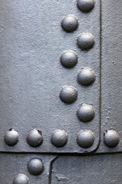 Metal surface with rivets clipart