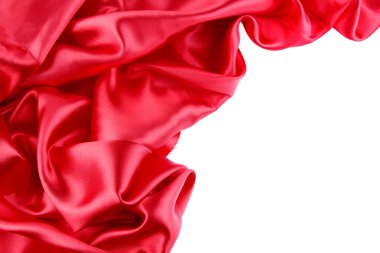Red silk fabric on plain background clipart