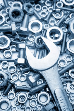 Wrench on nuts and bolts clipart