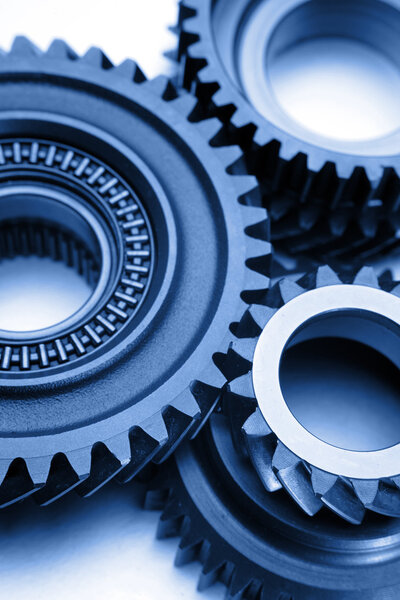 Closeup of three metal gears