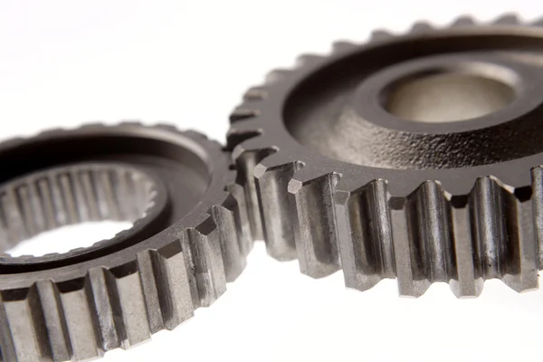 Two gears meshing together — Stock Photo, Image