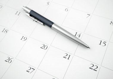 Pen on calendar clipart