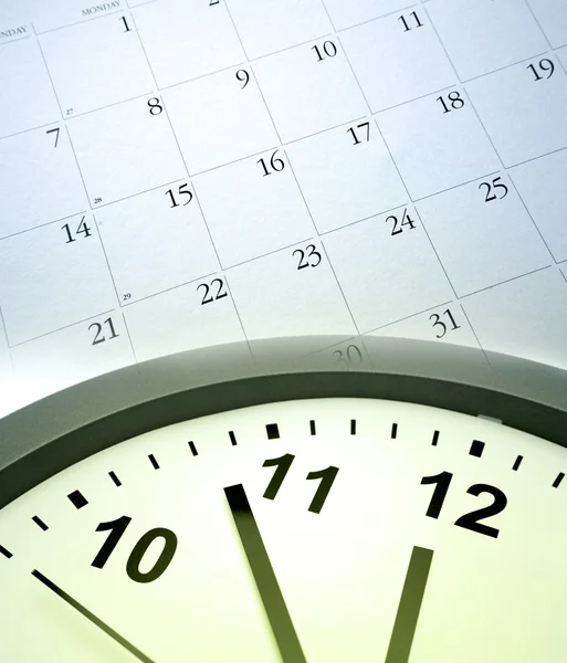 Klok en kalender — Stockfoto