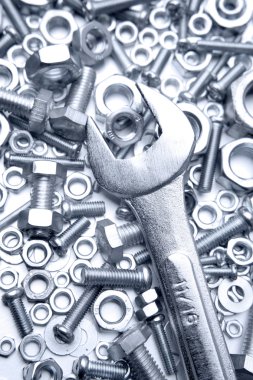 Wrench on nuts and bolts clipart