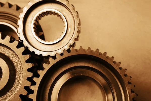 Closeup of steel gears meshing together — Stock Photo, Image