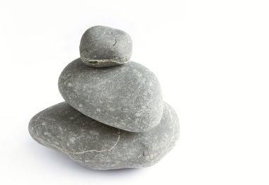 Three river rocks on plain background clipart