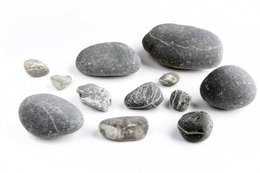 Closeup of rocks on plain background clipart