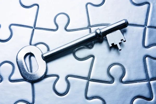 Key on puzzle — Stock Photo, Image