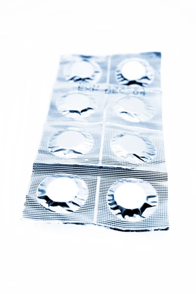 Pills in foil pack — Stock Photo, Image