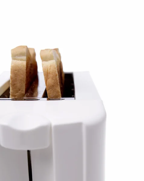 Toast w toster na prostym tle — Zdjęcie stockowe
