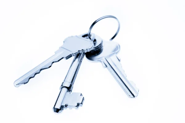 Three keys on plain background — Stock Photo, Image