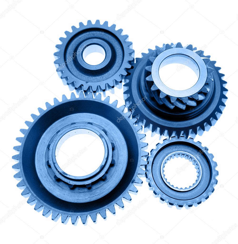 Four cogs connecting over white