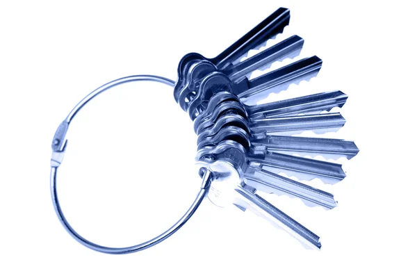 Bunch of keys on white — Stock Photo, Image
