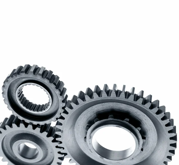 Closeup of steel gears meshing together — Stock Photo, Image