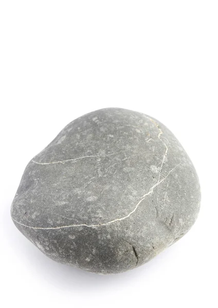 Камень на ровном фоне — стоковое фото