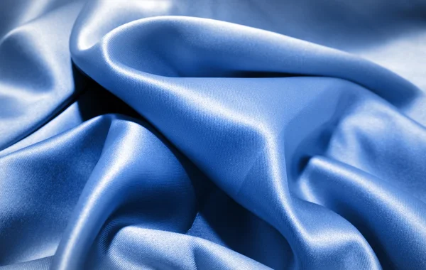 Folds in blue silk — Stock Photo, Image