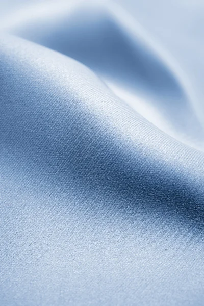 Folds in blue silk — Stock Photo, Image