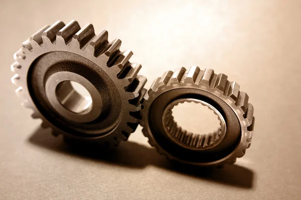 Two steel cogs together — Stock Photo, Image