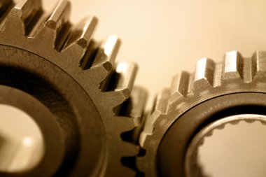 Two gears meshing together clipart