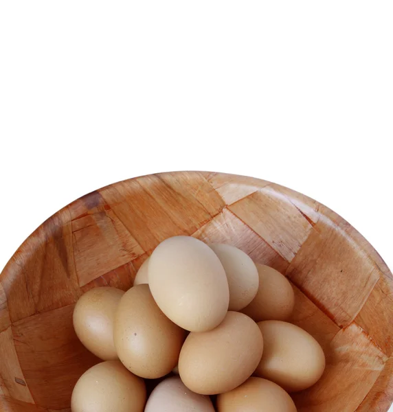 Closeup των αυγών σε μπολ σε απλό φόντο — Φωτογραφία Αρχείου
