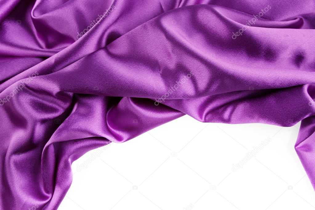 Purple silk fabric on plain background